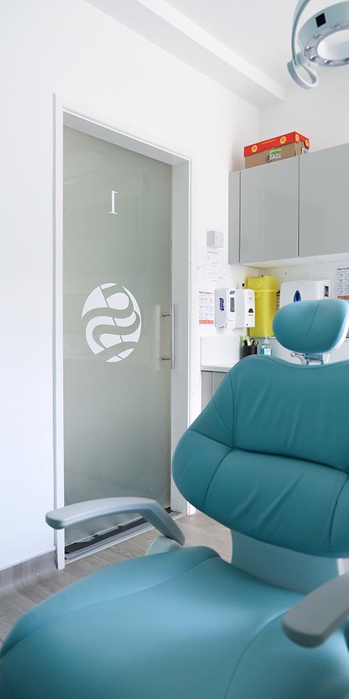 Sarum Dental Practice treatment room with close up of green dental chair